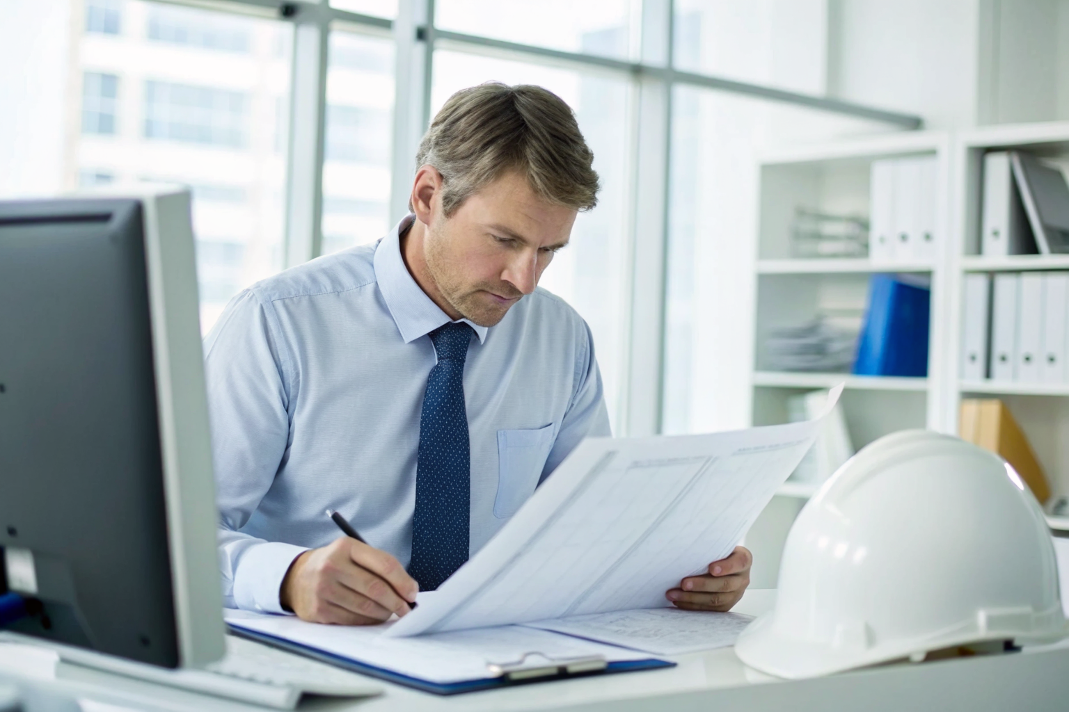 Auditor verifying checklist against Certificate of Destruction.